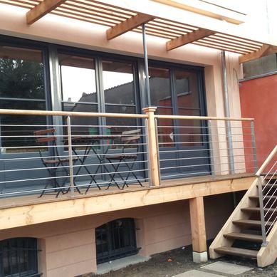 Agrandissement moderne claissique d'une maison
